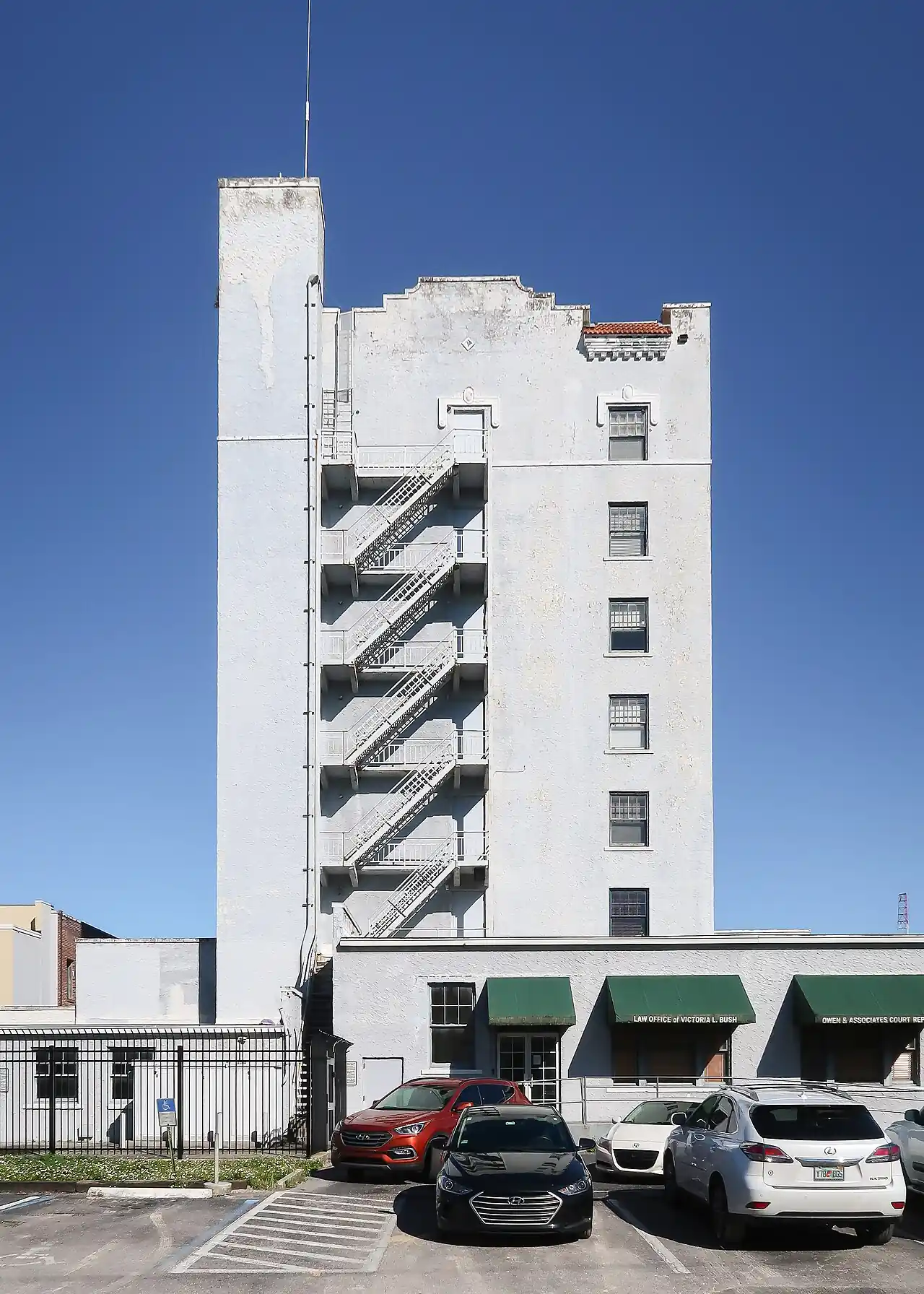 The former Marion Hotel building in downtown Ocala, a tall brick facade with arched windows.