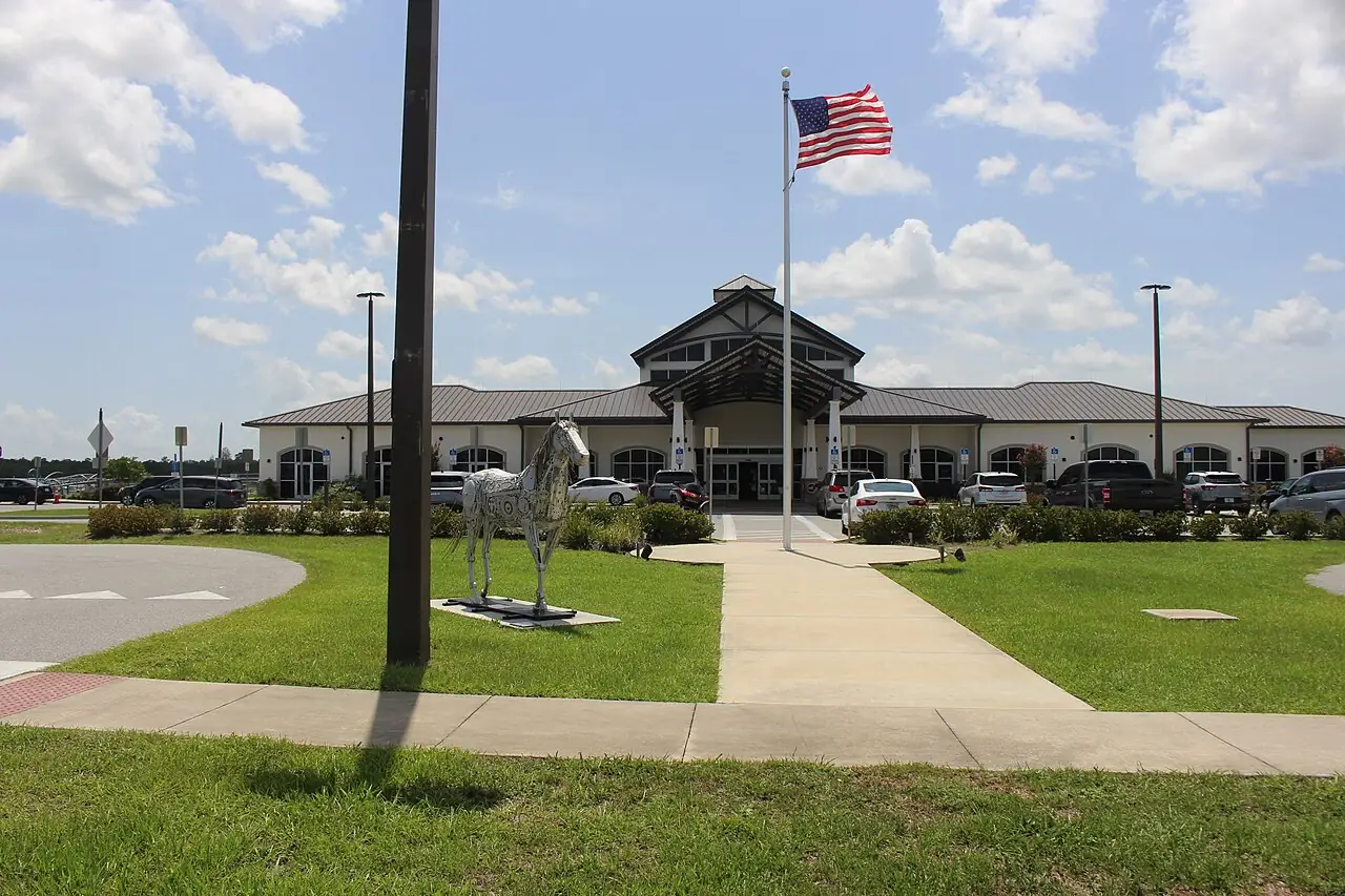 The terminal building at Ocala International Airport, a low modern building under a Florida sky.